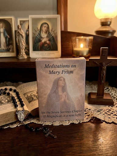 Meditations on Mary Prism box with Marian holy cards, a rosary and an open book