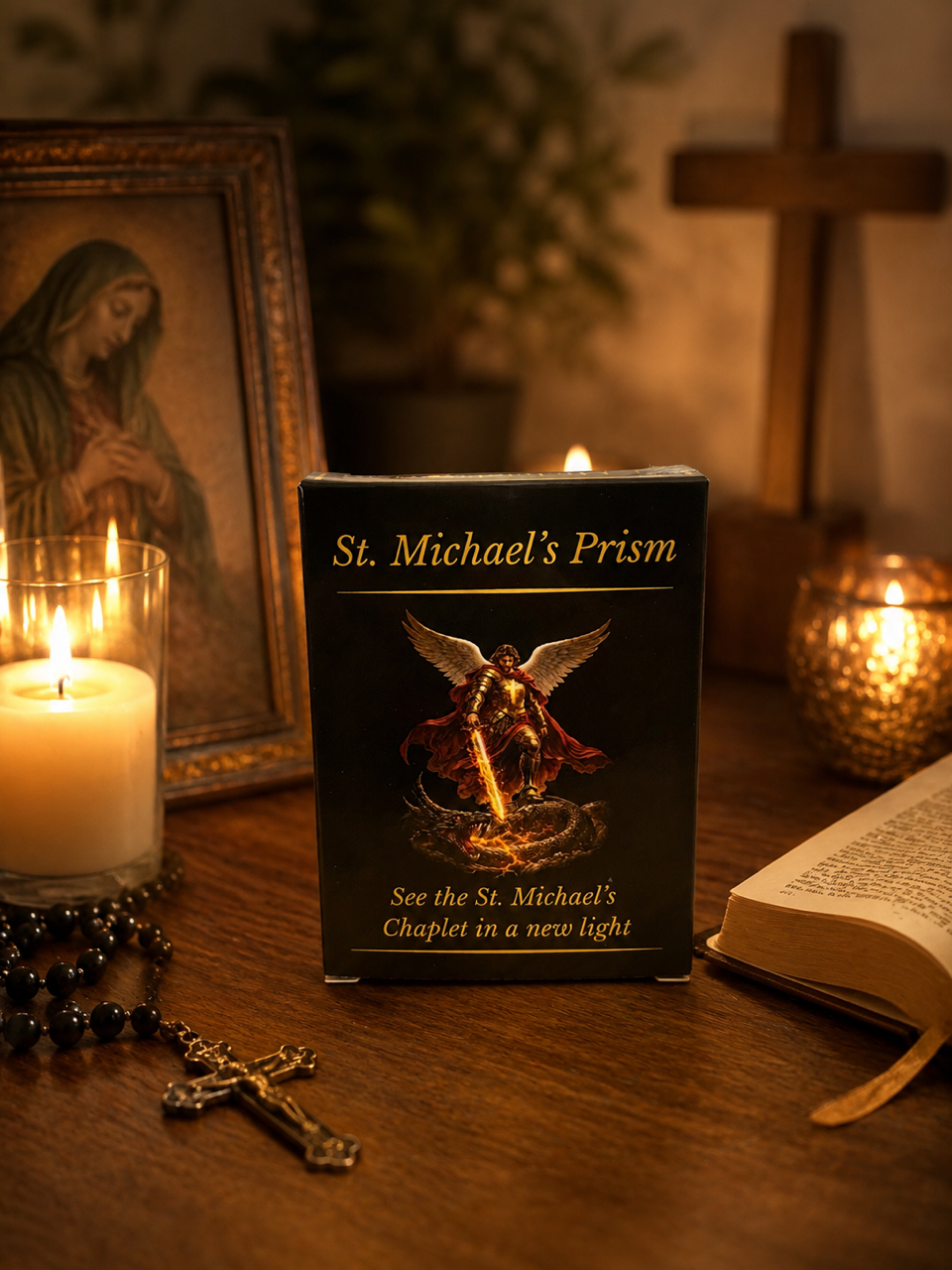 St. Michael's Prism box showing St. Michael, beside candles, a rosary and a picture of Mary